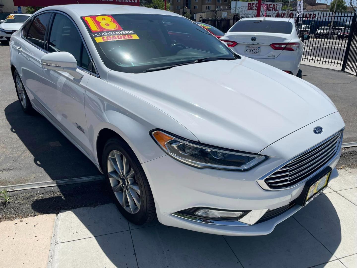 2018 WHITE /BLACK Ford Fusion Energi Titanium (3FA6P0SU6JR) with an 2.0L L4 DOHC 16V HYBRID engine, CVT transmission, located at 744 E Miner Ave, Stockton, CA, 95202, (209) 944-5770, 37.956863, -121.282082 - PLUS TAXES AND FEES - Photo#1